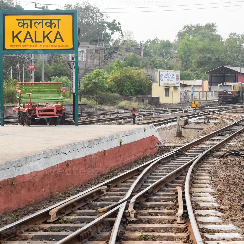 View of Toy train Railway Tracks from the middle during daytime near Kalka railway station in India, Toy train track view, Indian Railway junction, Heavy industry photo