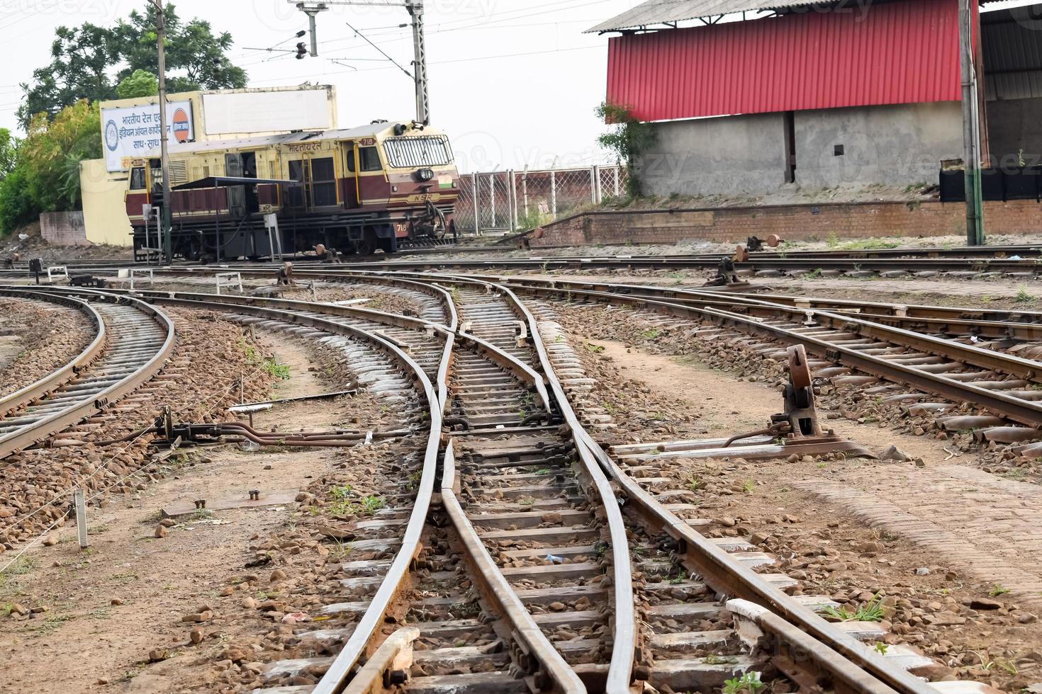 View of Toy train Railway Tracks from the middle during daytime near Kalka railway station in India, Toy train track view, Indian Railway junction, Heavy industry photo