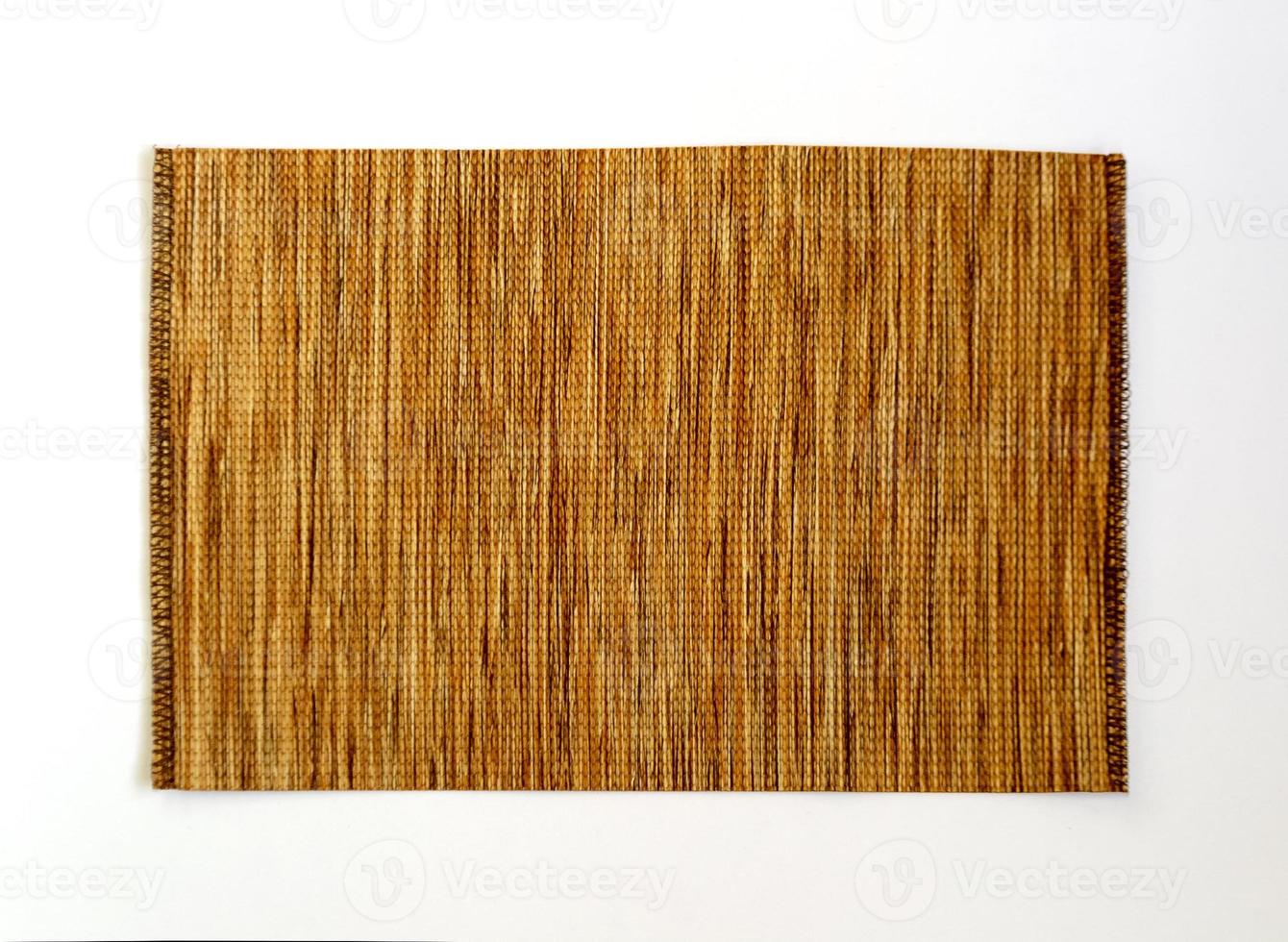 Brown fabric swatch sample isolated on white background photo