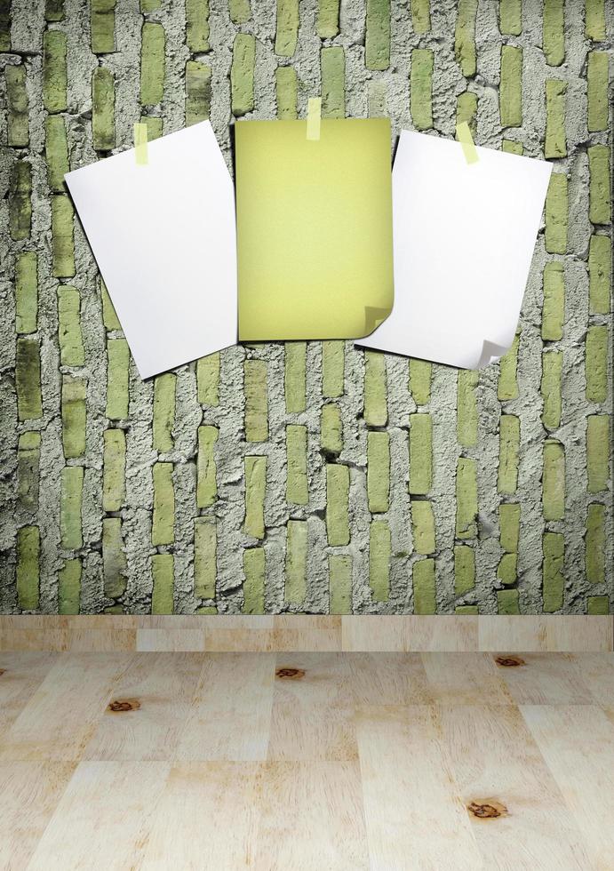 White paper and old paper on the gray brick wall photo