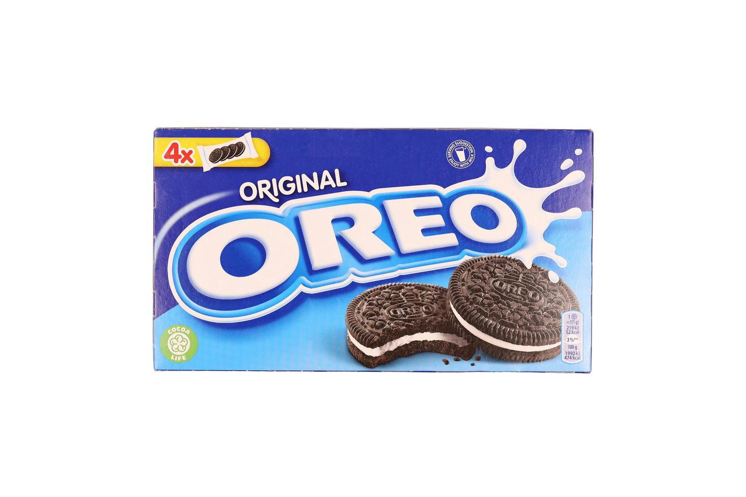 KHARKOV, UKRAINE - DECEMBER 8, 2020 Oreo sandwich cookies box on white background. Oreo is goods manufactured by Nabisco division of Mondelez International photo