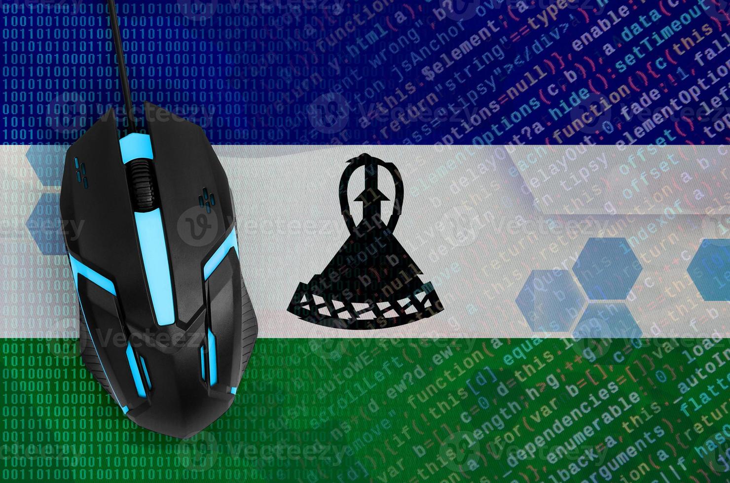 Lesotho flag  and computer mouse. Digital threat, illegal actions on the Internet photo