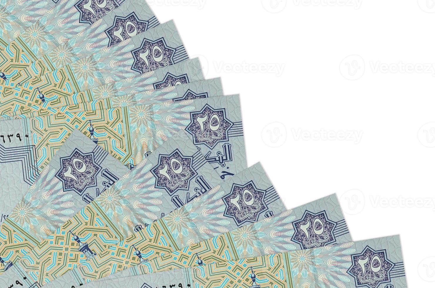 25 Egyptian piastres bills lies isolated on white background with copy space stacked in fan close up photo