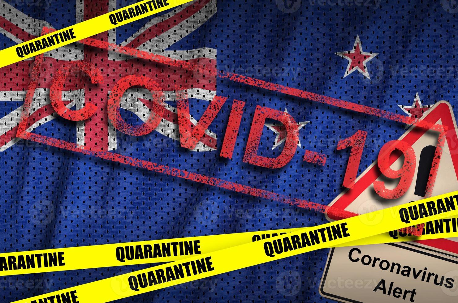 New Zealand flag and Covid-19 quarantine yellow tape with red stamp. Coronavirus or 2019-nCov virus photo