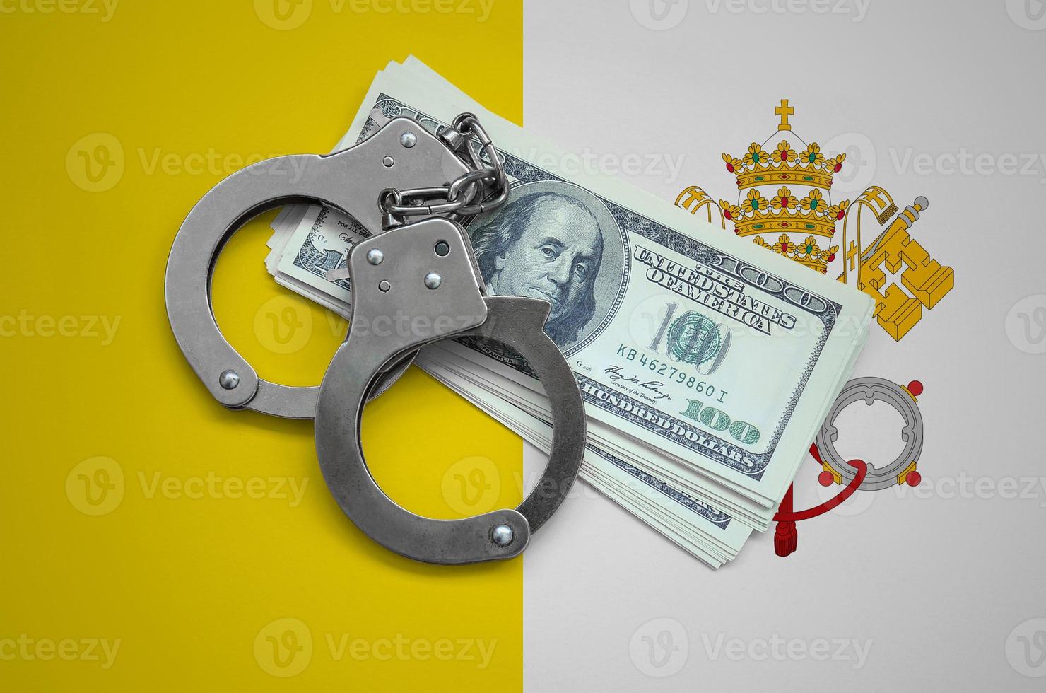 Vatican City State flag  with handcuffs and a bundle of dollars. Currency corruption in the country. Financial crimes photo