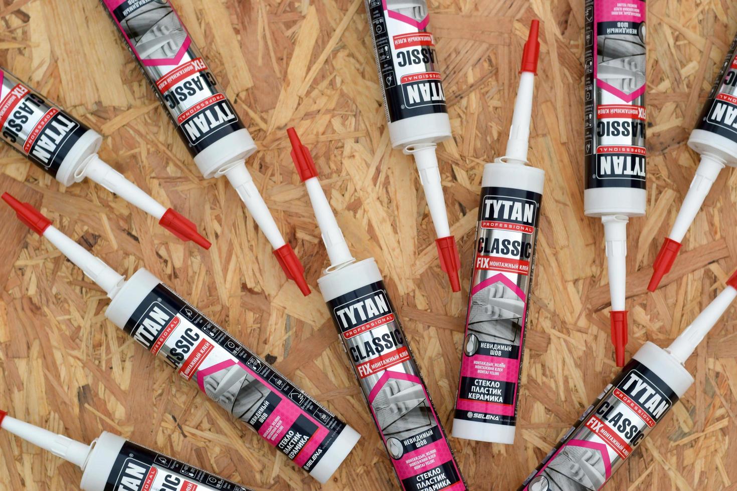 KHARKIV, UKRAINE - MAY 02, 2021 Assembly adhesive tytan professional classic fix invisible seam by Selena Group. Selena Group is a global leader and distributor of construction chemicals photo