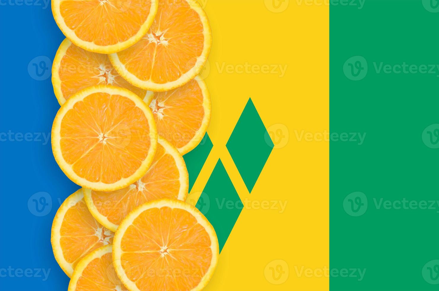 Saint Vincent and the Grenadines flag and citrus fruit slices vertical row photo