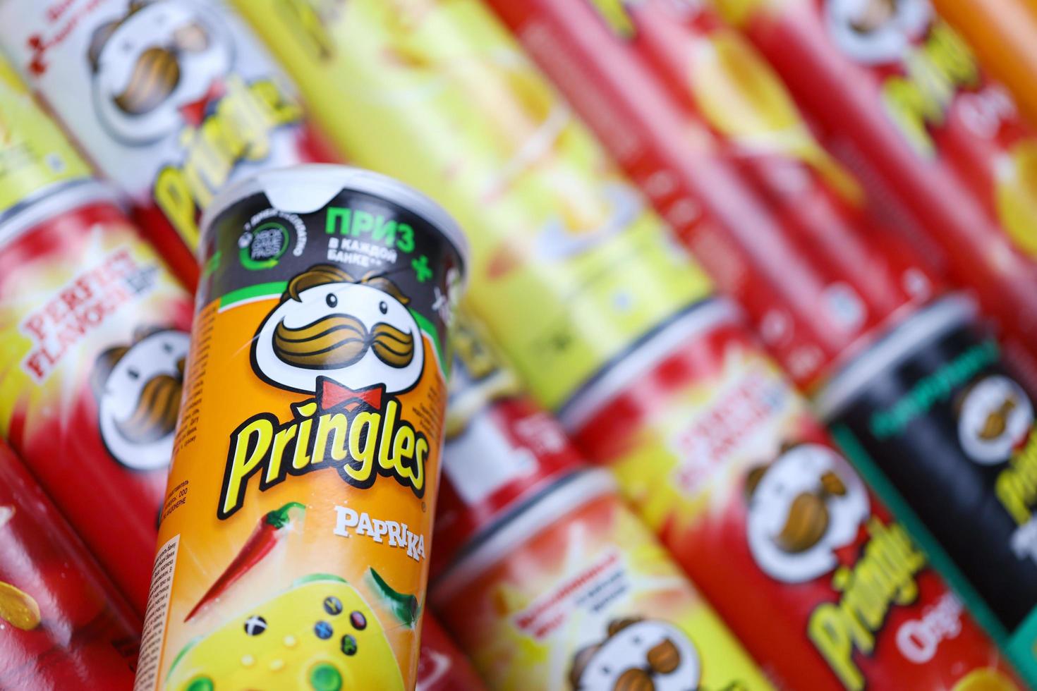 KHARKOV, UKRAINE - MARCH 30, 2021 Many Pringles cylinder chips boxes ...