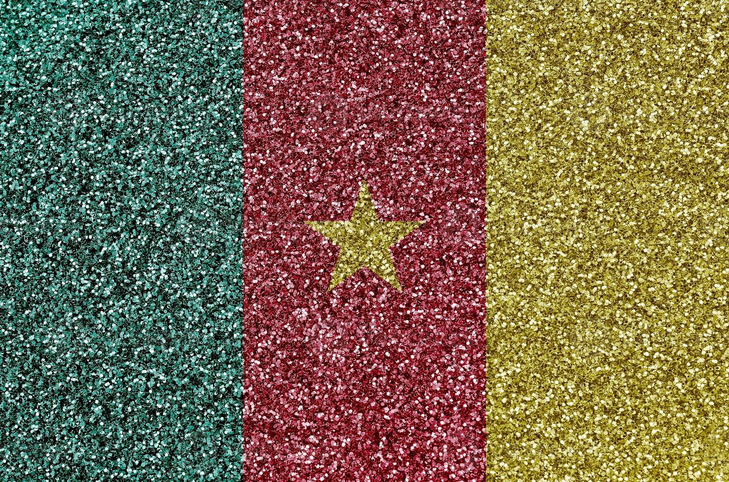 Cameroon flag depicted on many small shiny sequins. Colorful festival background for party photo