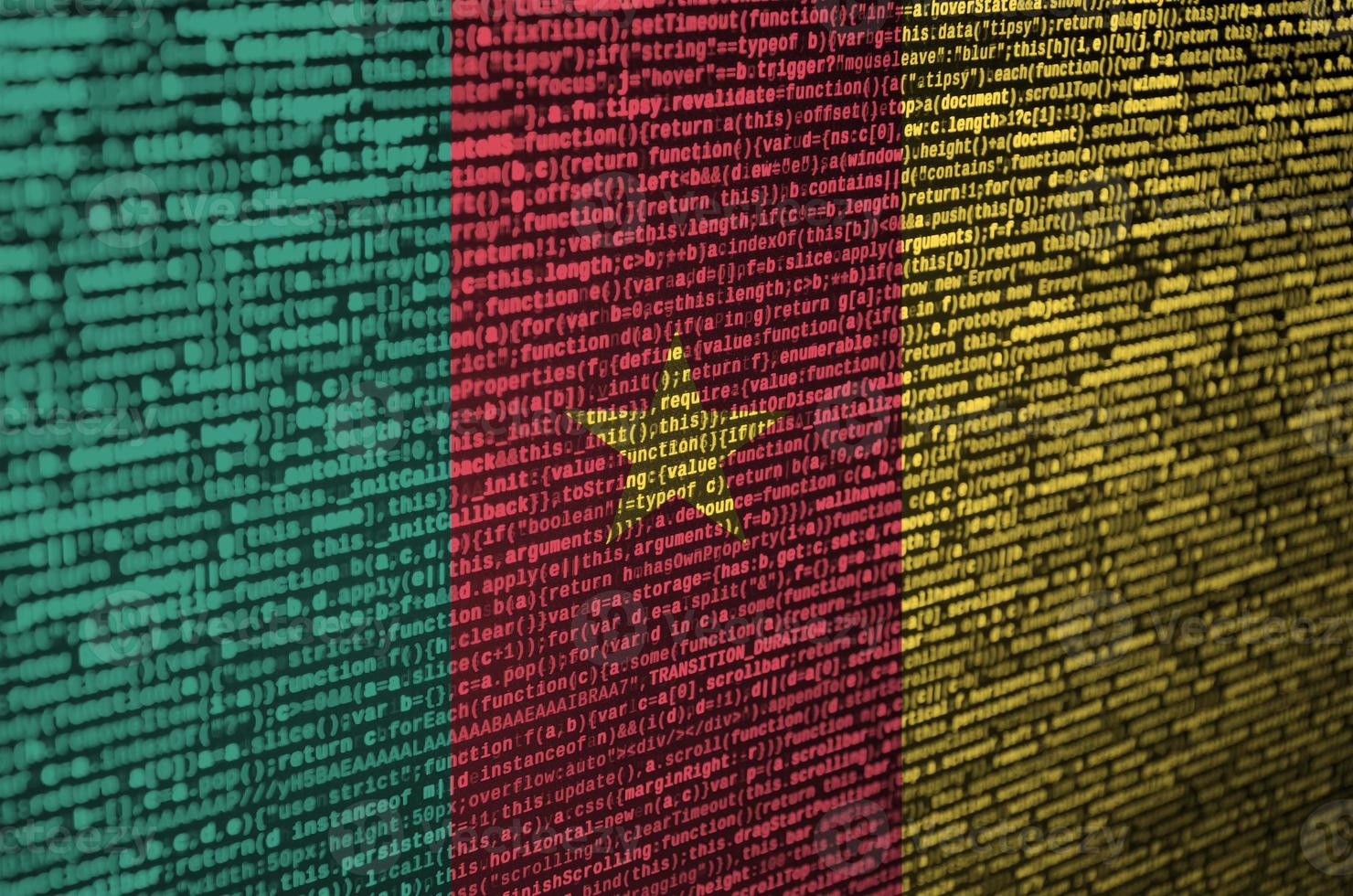 Cameroon flag  is depicted on the screen with the program code. The concept of modern technology and site development photo