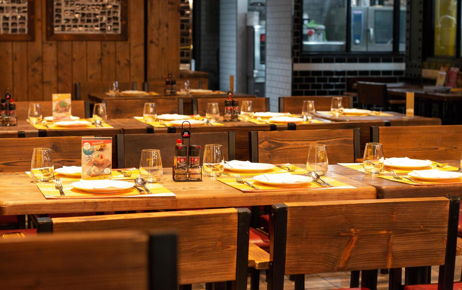 dinner table set in restaurant at night photo