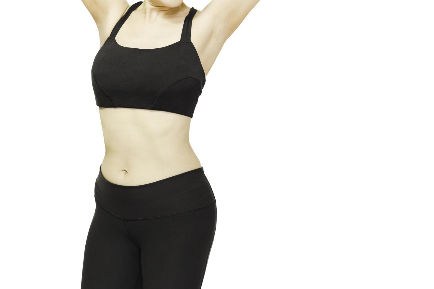 Beautiful healthy asian woman with sport wear isolated in clipping path. photo