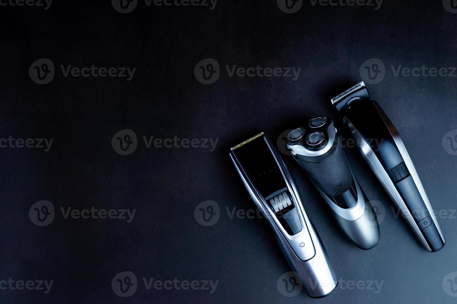 hair clipper black background. photo