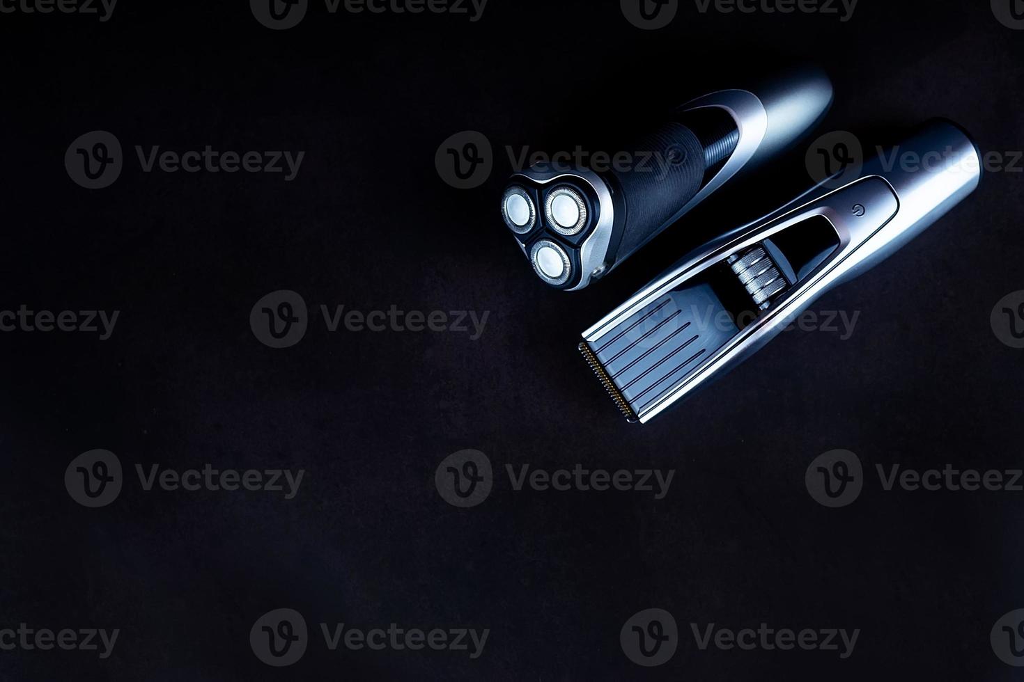 hair clipper black background. photo