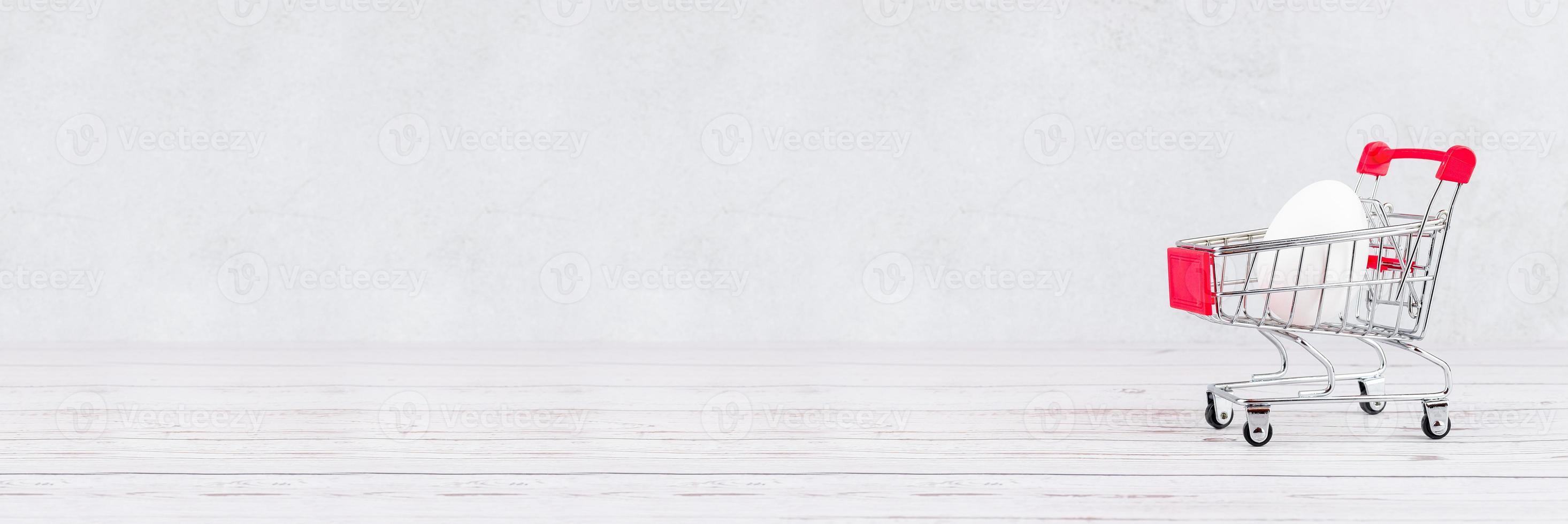 chicken eggs on a wooden background photo