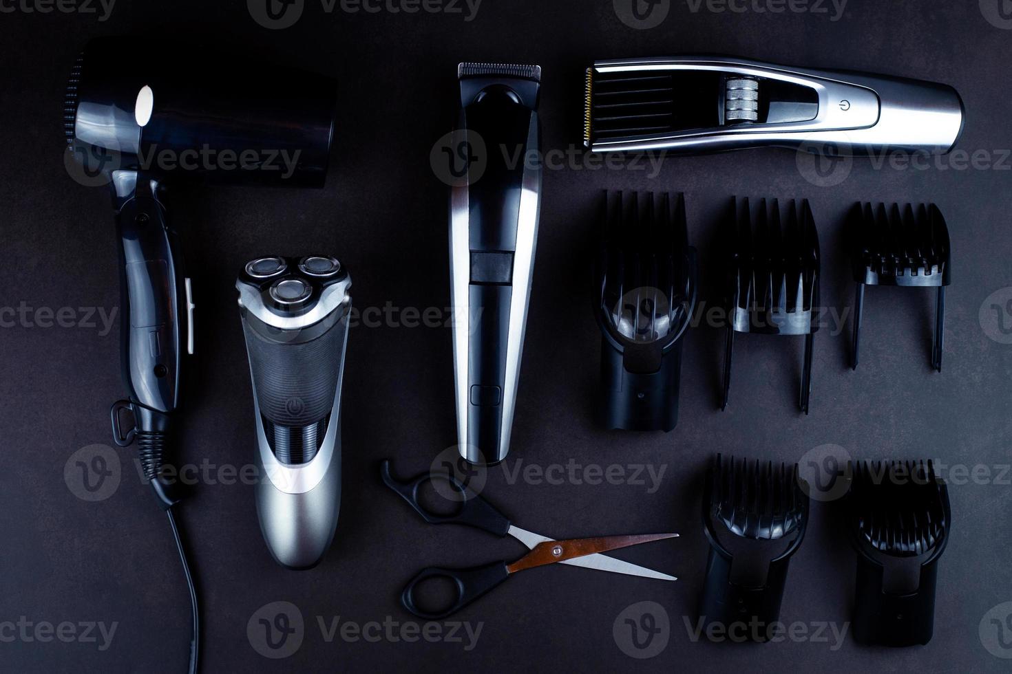 hair clipper black background. photo