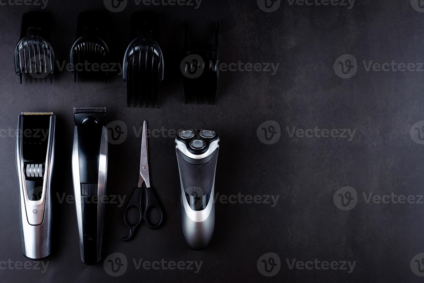 hair clipper black background. photo