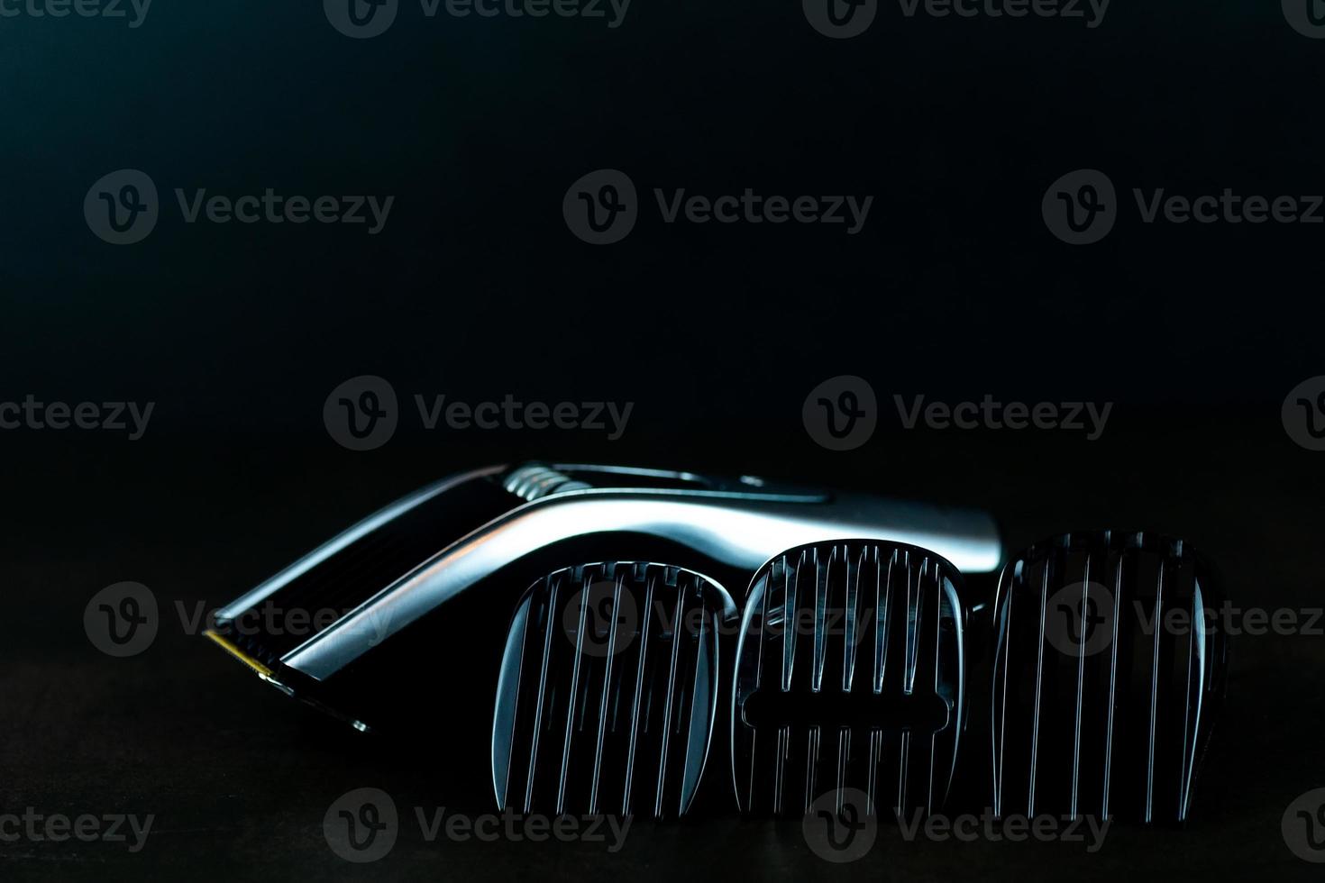 hair clipper black background photo