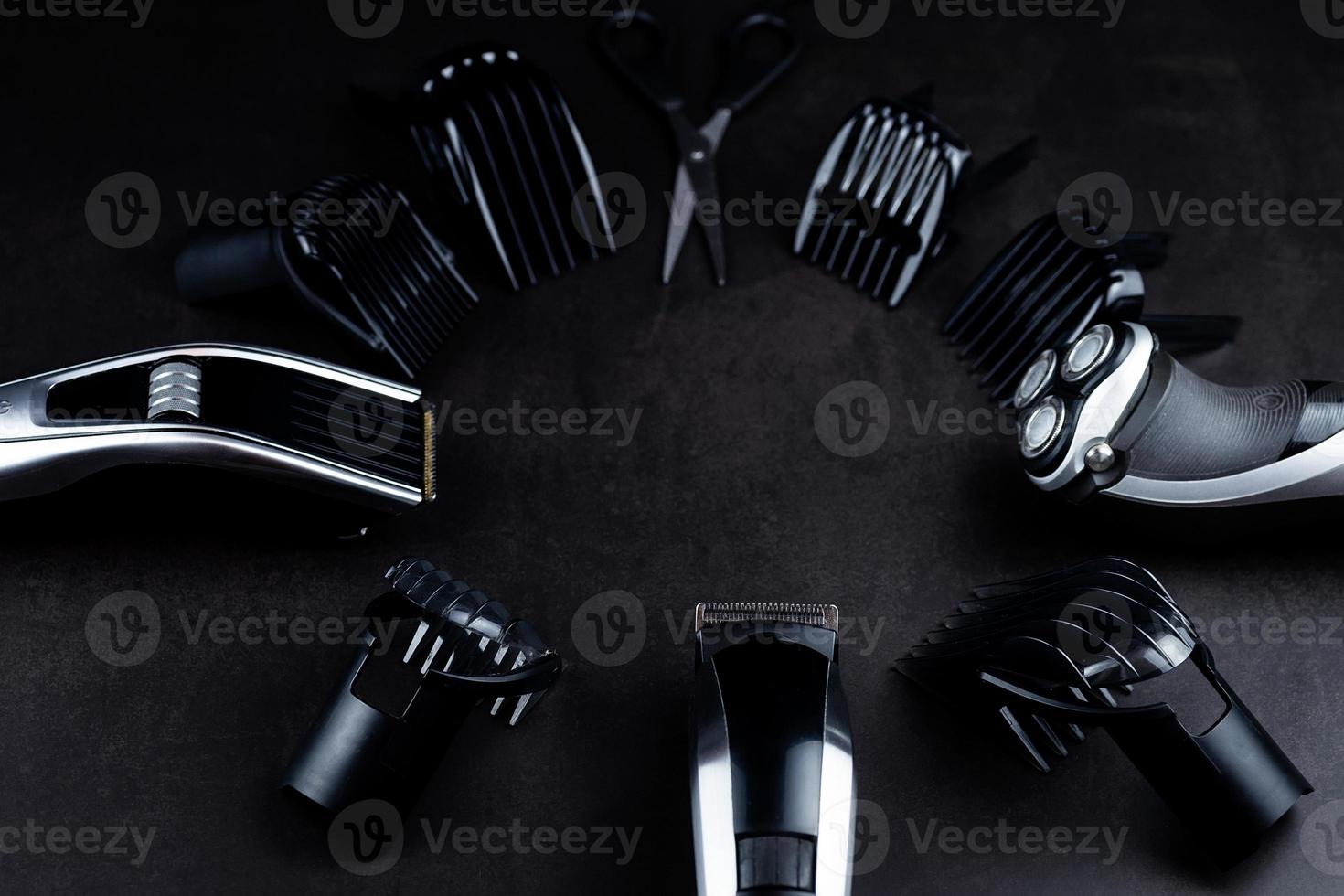 hair clipper black background. photo