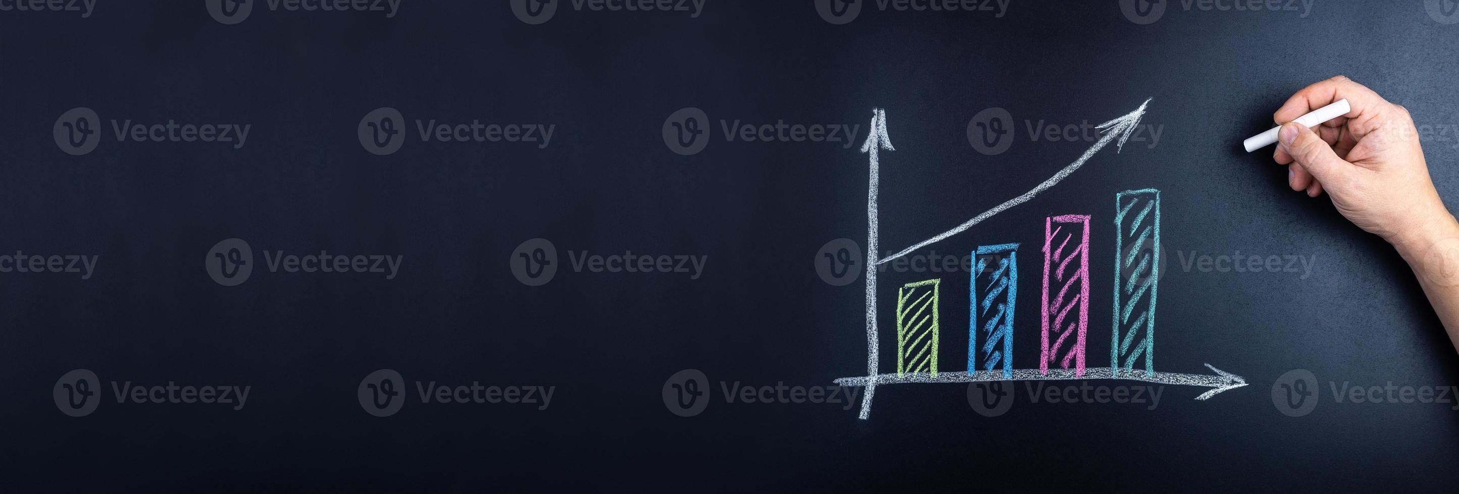 hand drawing a business chart photo