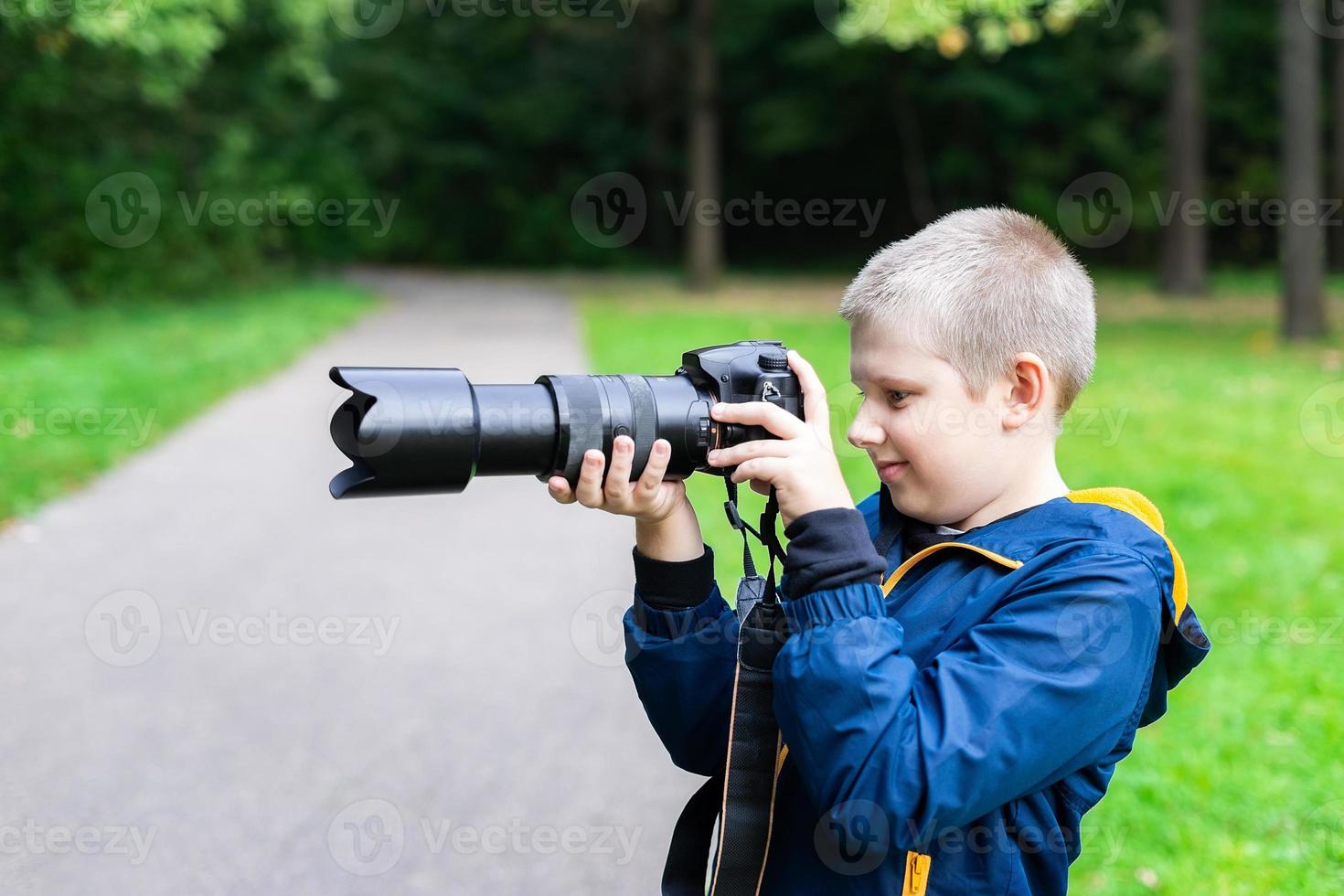 the boy with the camera photo