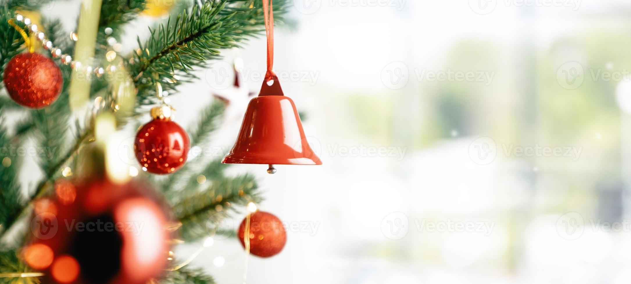 Merry Christmas and happy new year concept, Closeup Christmas bell  with bokeh, Xmas holiday background. photo