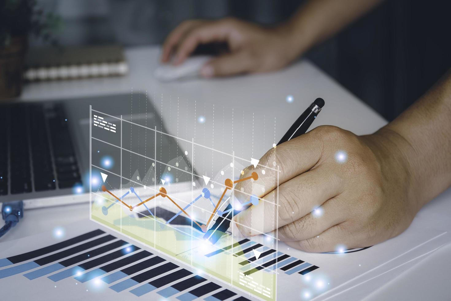 Businessman analyzing trading graph financial data.Business finance background.stock Market Investments Funds and Digital Assets photo