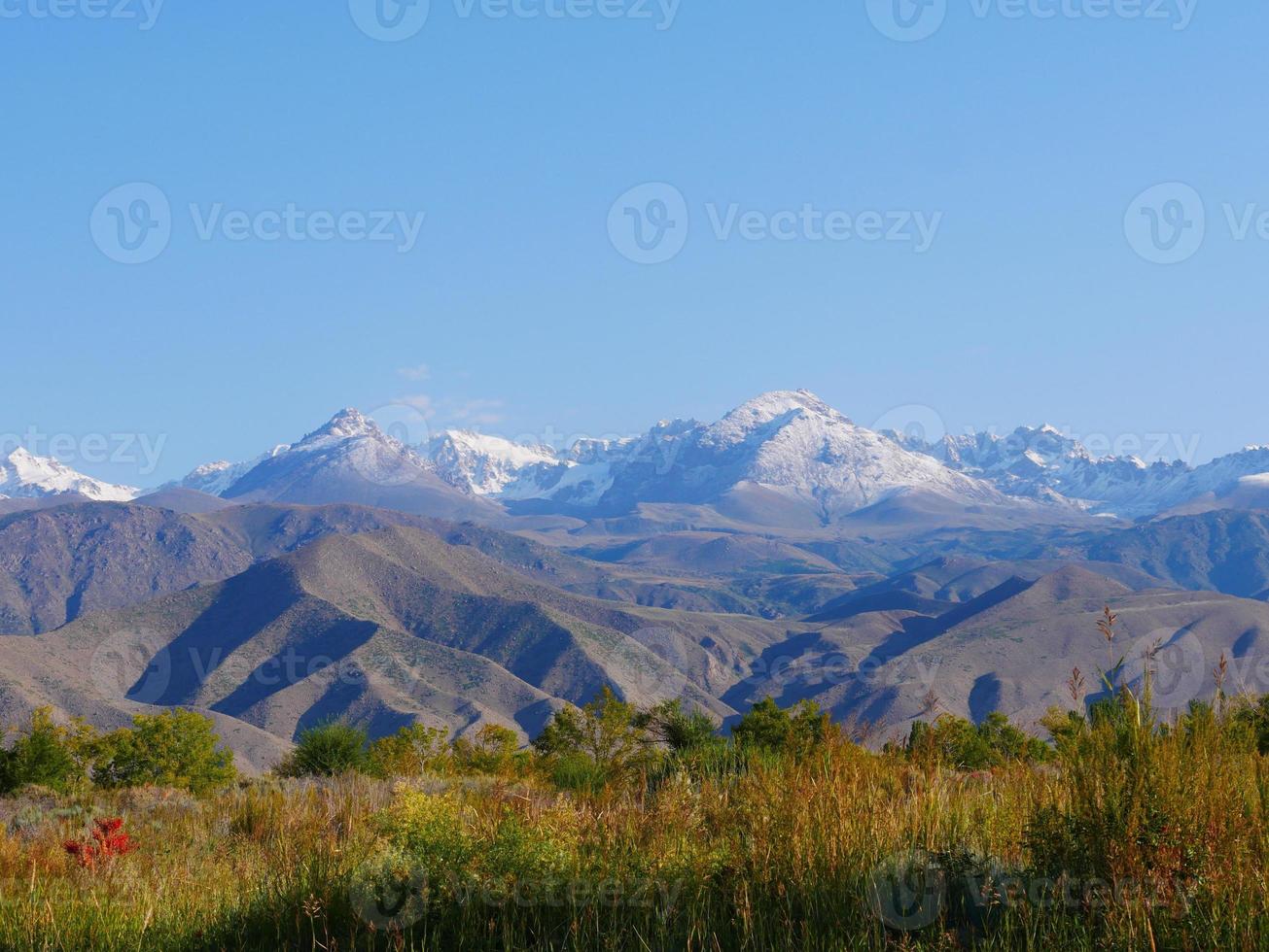 Landscape near Cholpon Ata, Kyrgyzstan, with mountains in the background photo