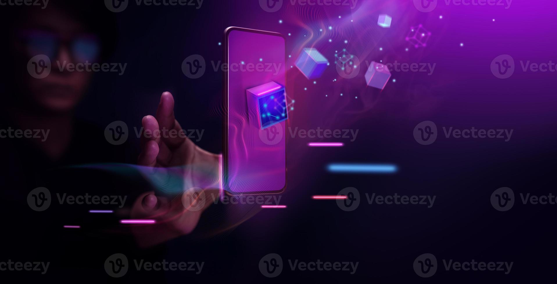 Metaverse and Blockchain Technology Concepts. Person with an Experiences of Metaverse Virtual World via Smart Phone. Futuristic Tone. Conceptual Photo