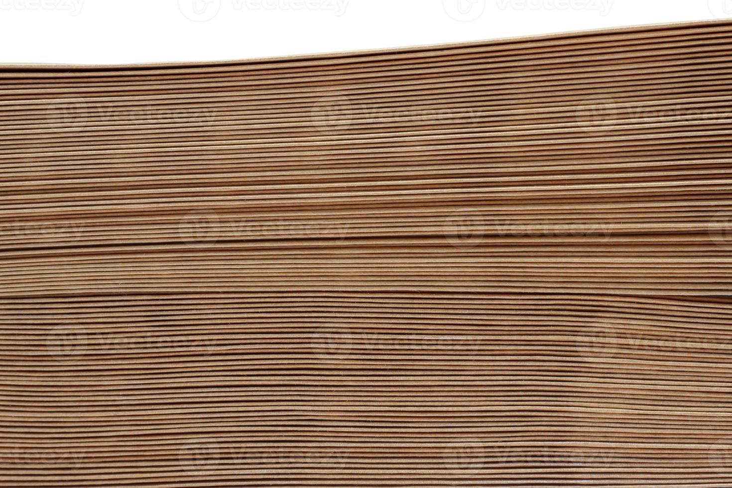 Stacked brown paper envelopes isolated on white background. photo