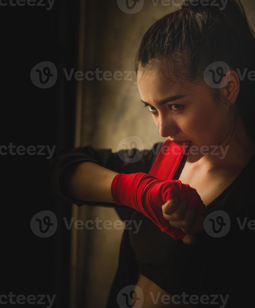 Young and beautiful female boxer photo