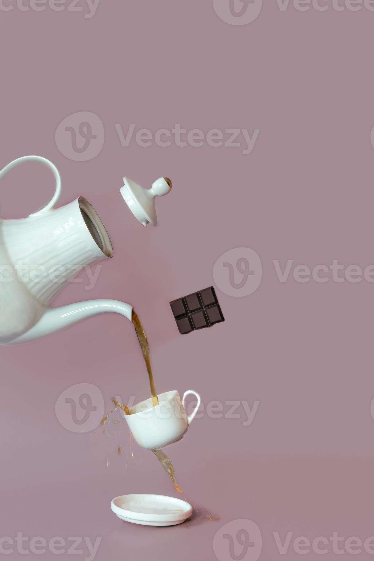 A close up photography of a tea using a teapot and cup. Tea time