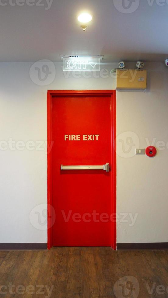 Emergency fire exit door. Red Color metal material. photo