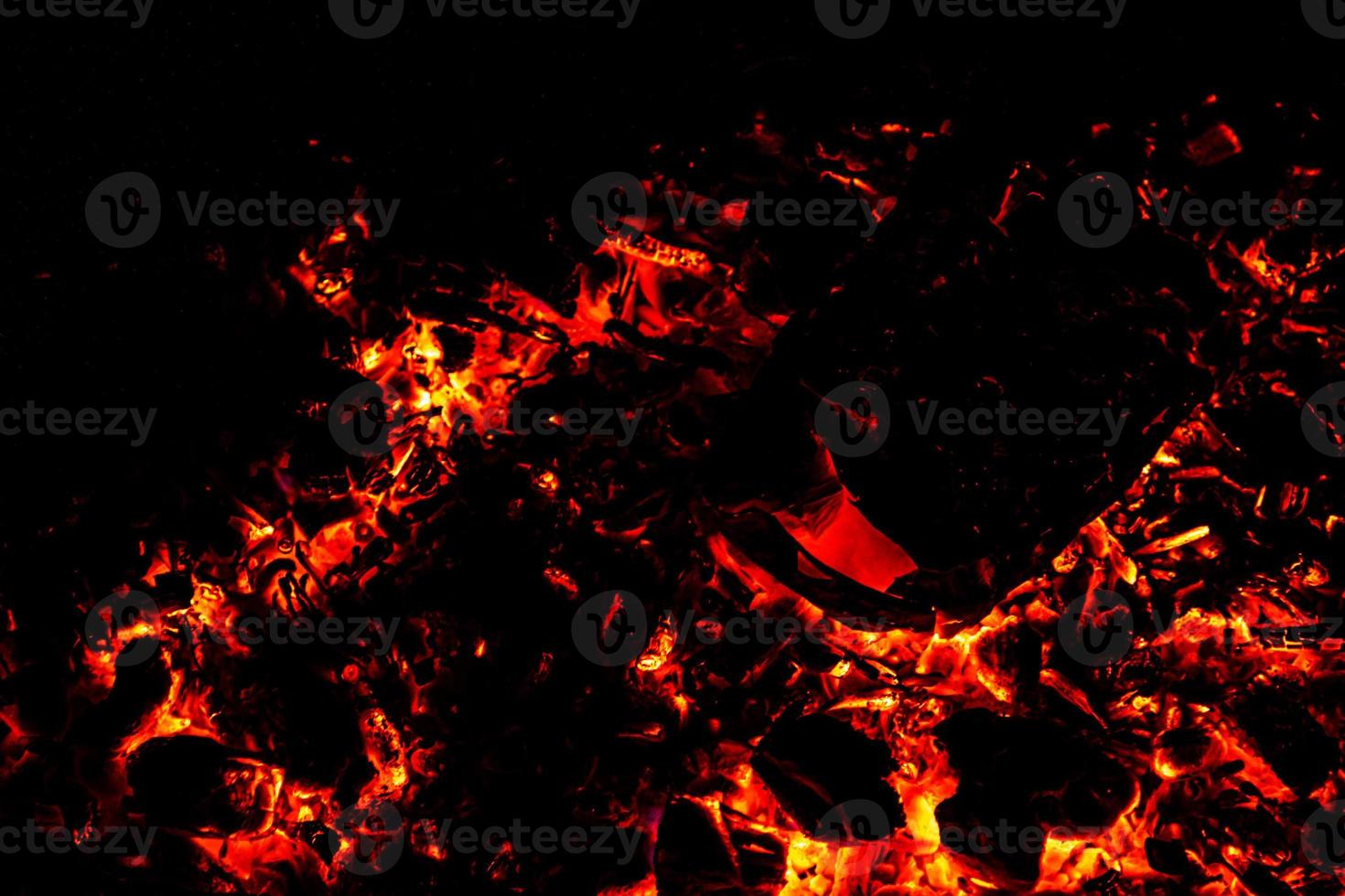 Fire flame texture. Burning material backdrop. Burn effect pattern. Blaze and torch wallpaper. Heat and haze backdrop. photo