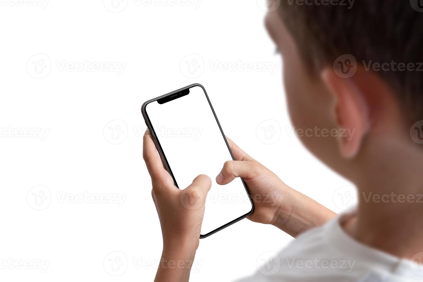 Boy holding smart phone with isolated display and background photo