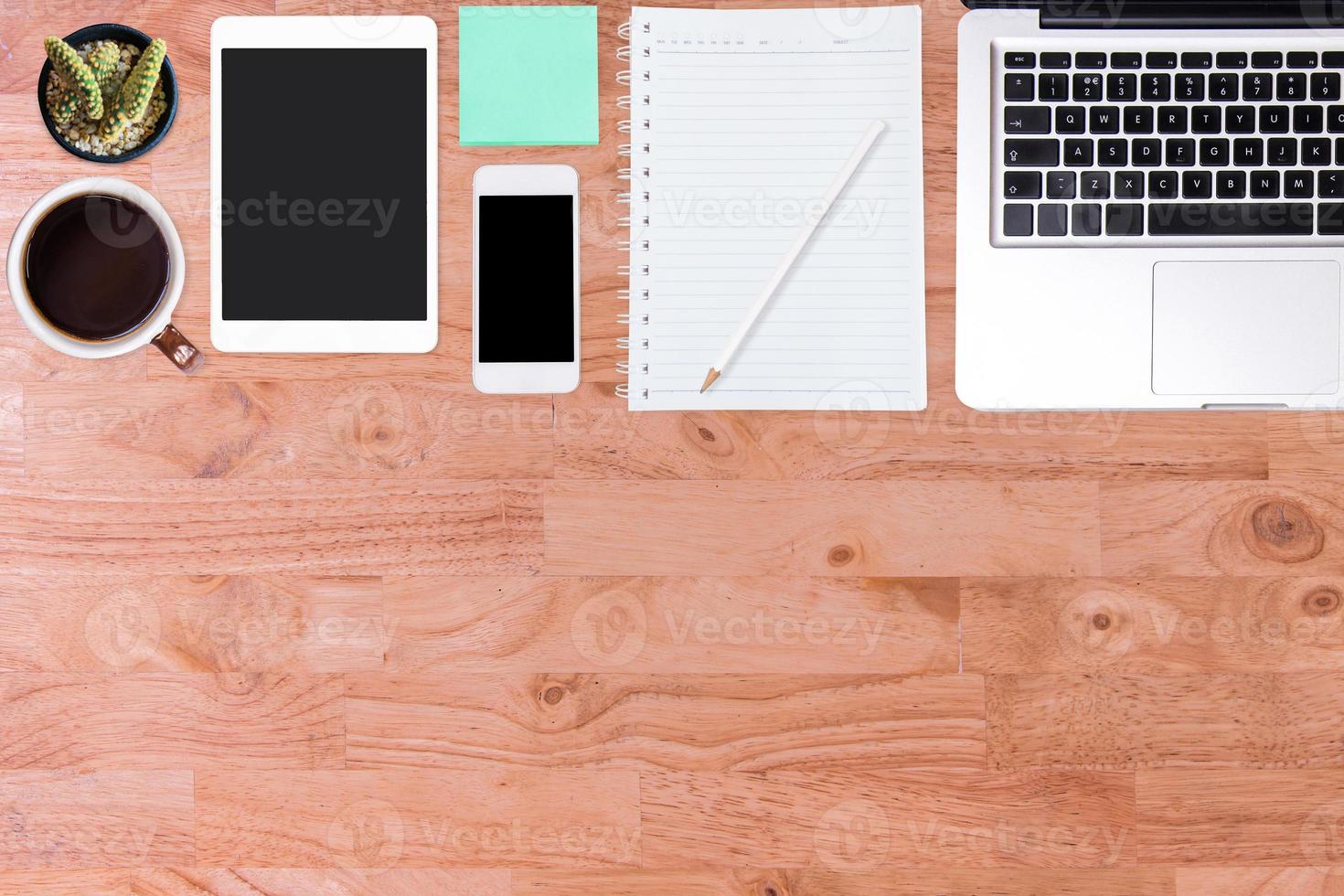 Top view of  wooden office desk table. photo