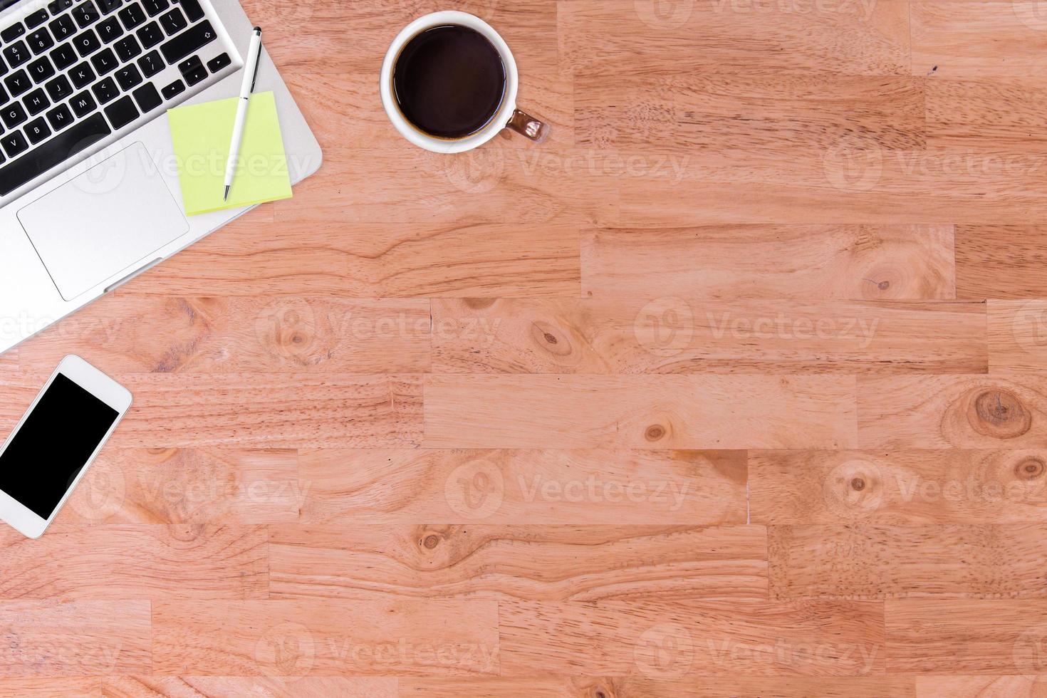 Top view of  wooden office desk table. photo