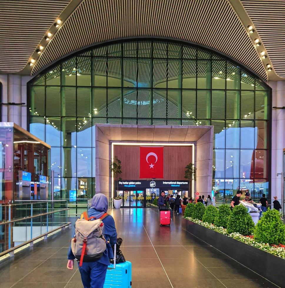 Istanbul, Turkey in July 2022. The front door of Istanbul Airport is very magnificent and beautiful, decorated with the turkish flag that stands. photo