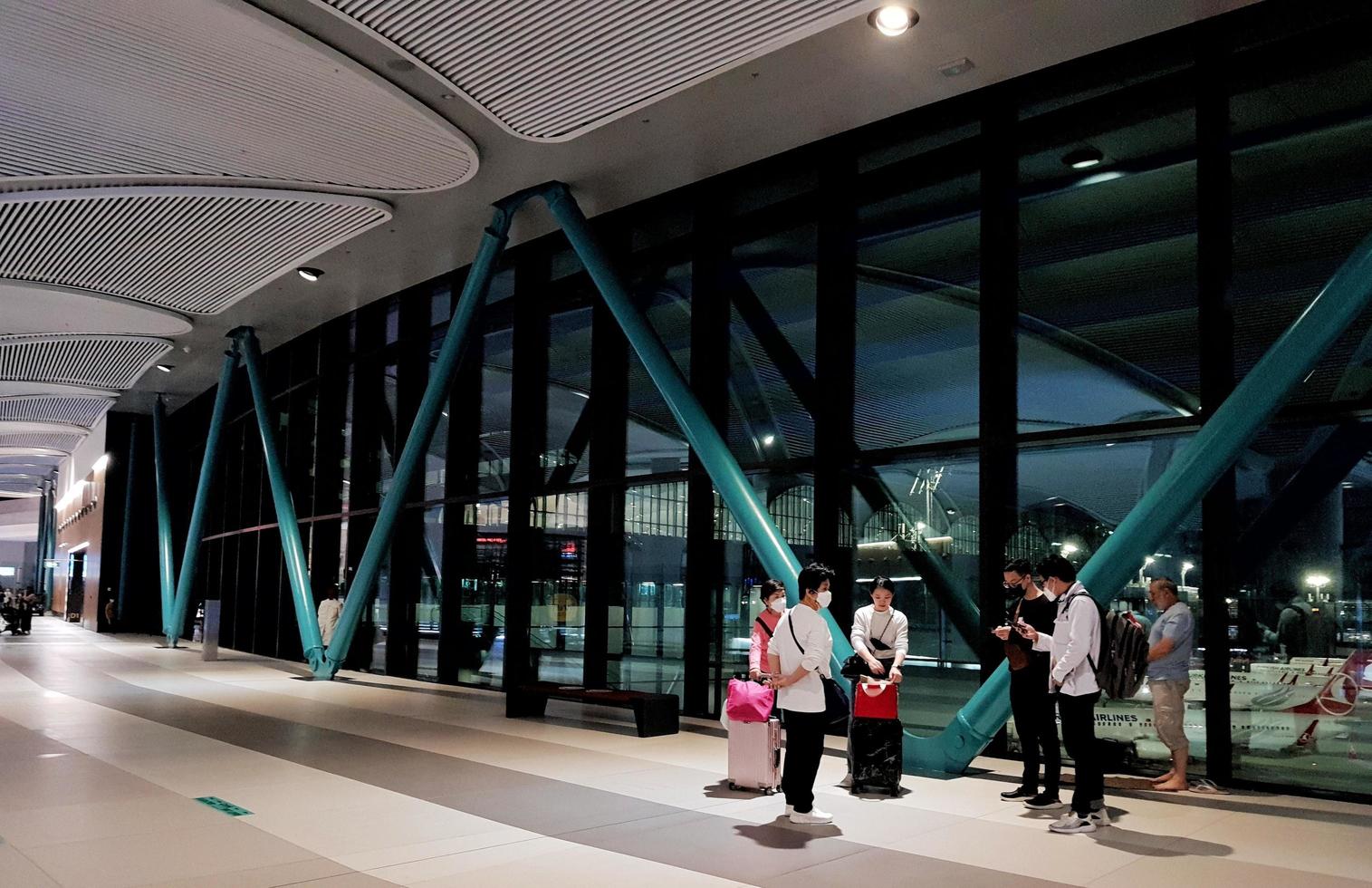 Istanbul, Turkey in July 2022. The condition of a flight departure hall at Istanbul Airport at night, looks quite deserted because the plane lands in the early hours of the morning, photo