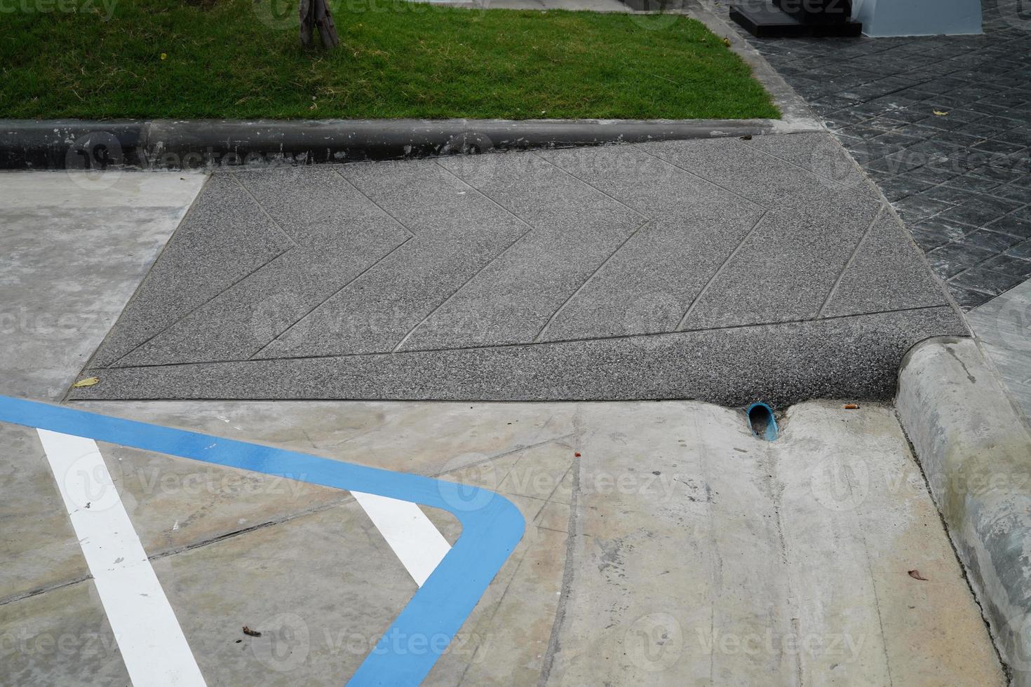 Building entrance trail with ramp for old or cannot self help disability person on wheelchair. photo