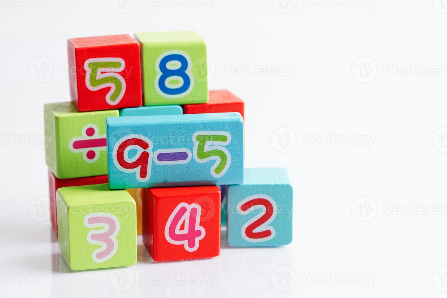 Number wood block cubes for learning Mathematic, education math concept. photo