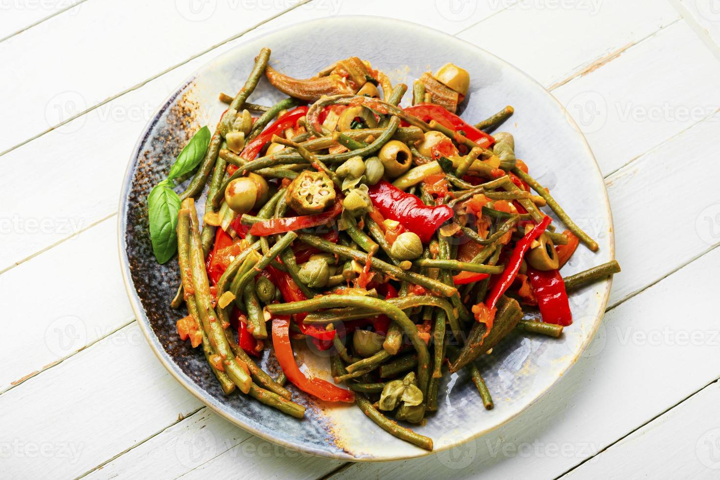 Hot vegetable salad photo