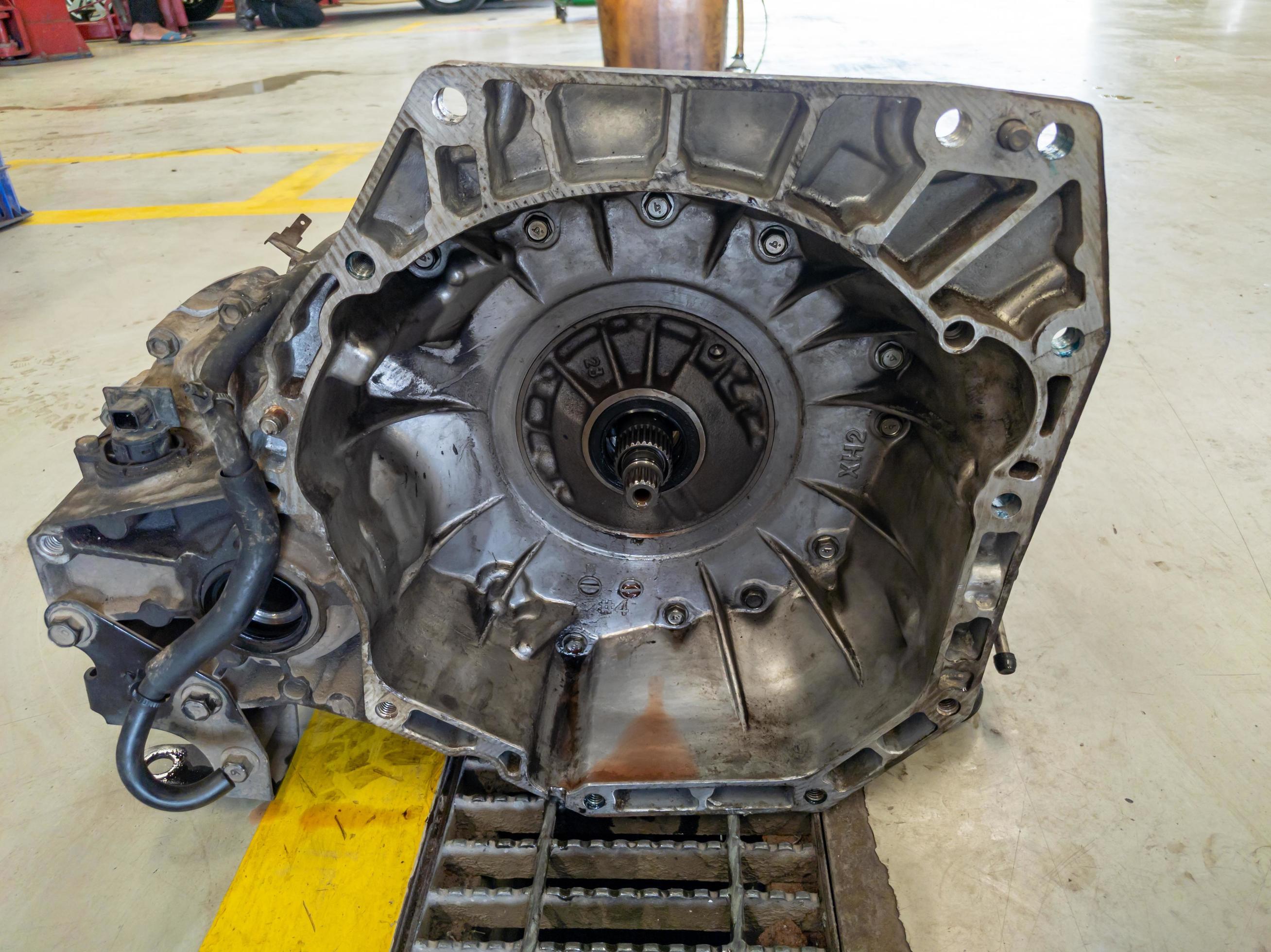 Automatic transmission or automatic transaxle being repaired at an auto