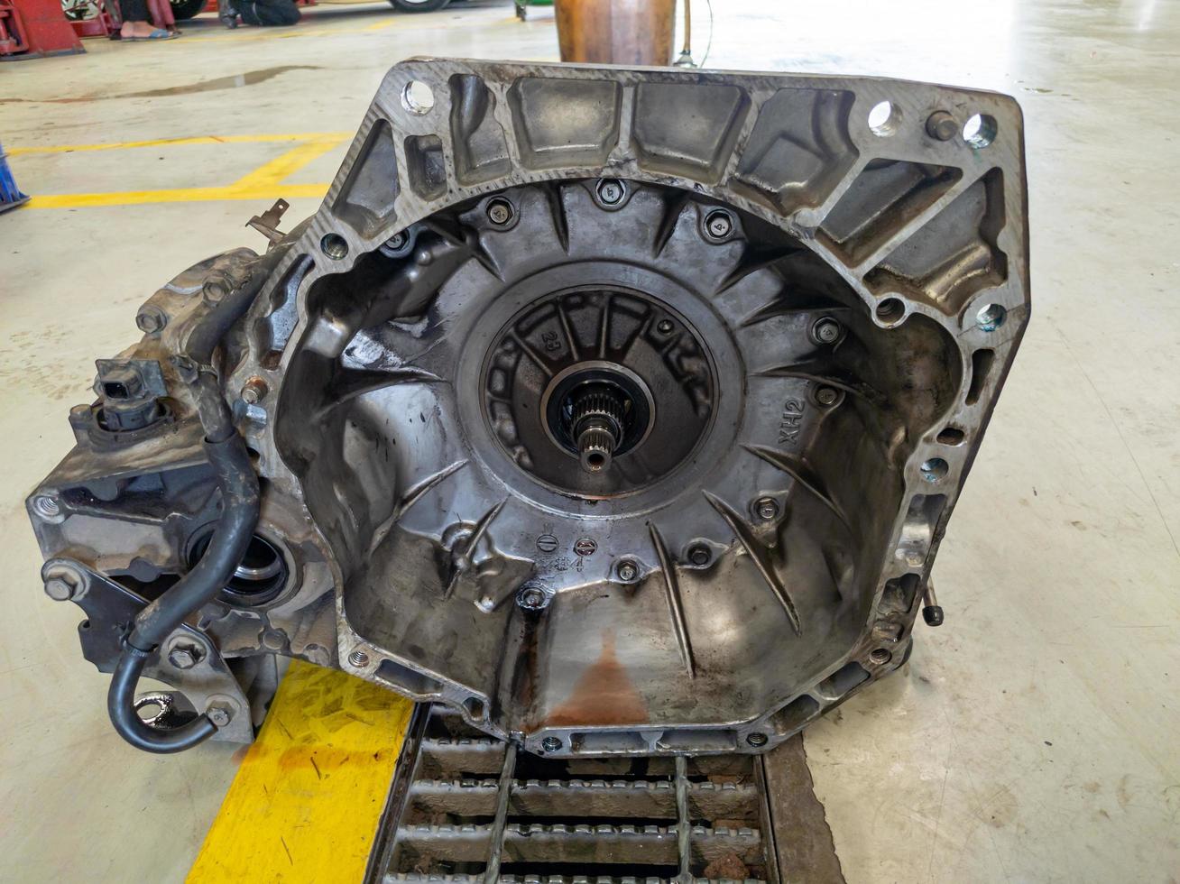 Automatic transmission or automatic transaxle being repaired at an auto