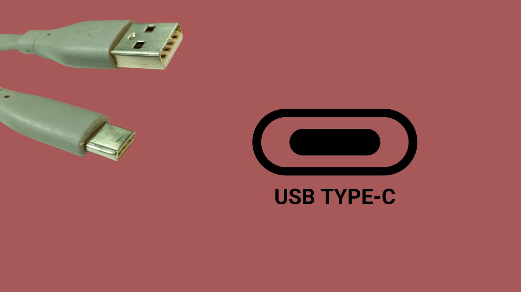 illustration Concept of European Union law to force USB-C charger for all mobile phones. EU flag and USBC universal charging cable. Selective focus. photo