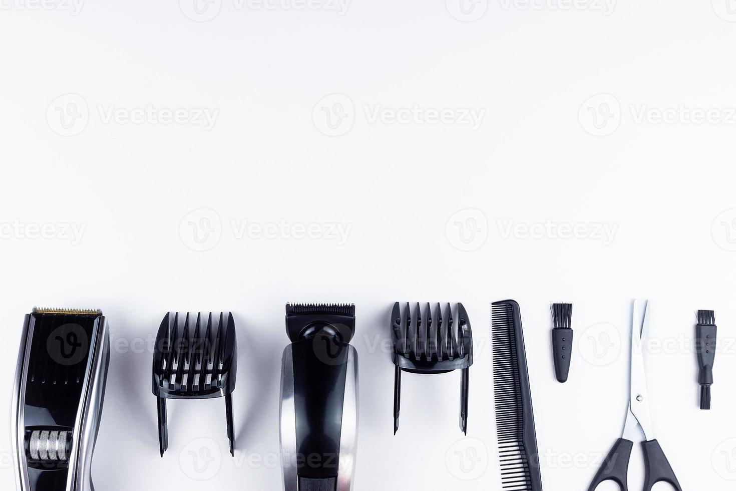 scissors and combs on white photo