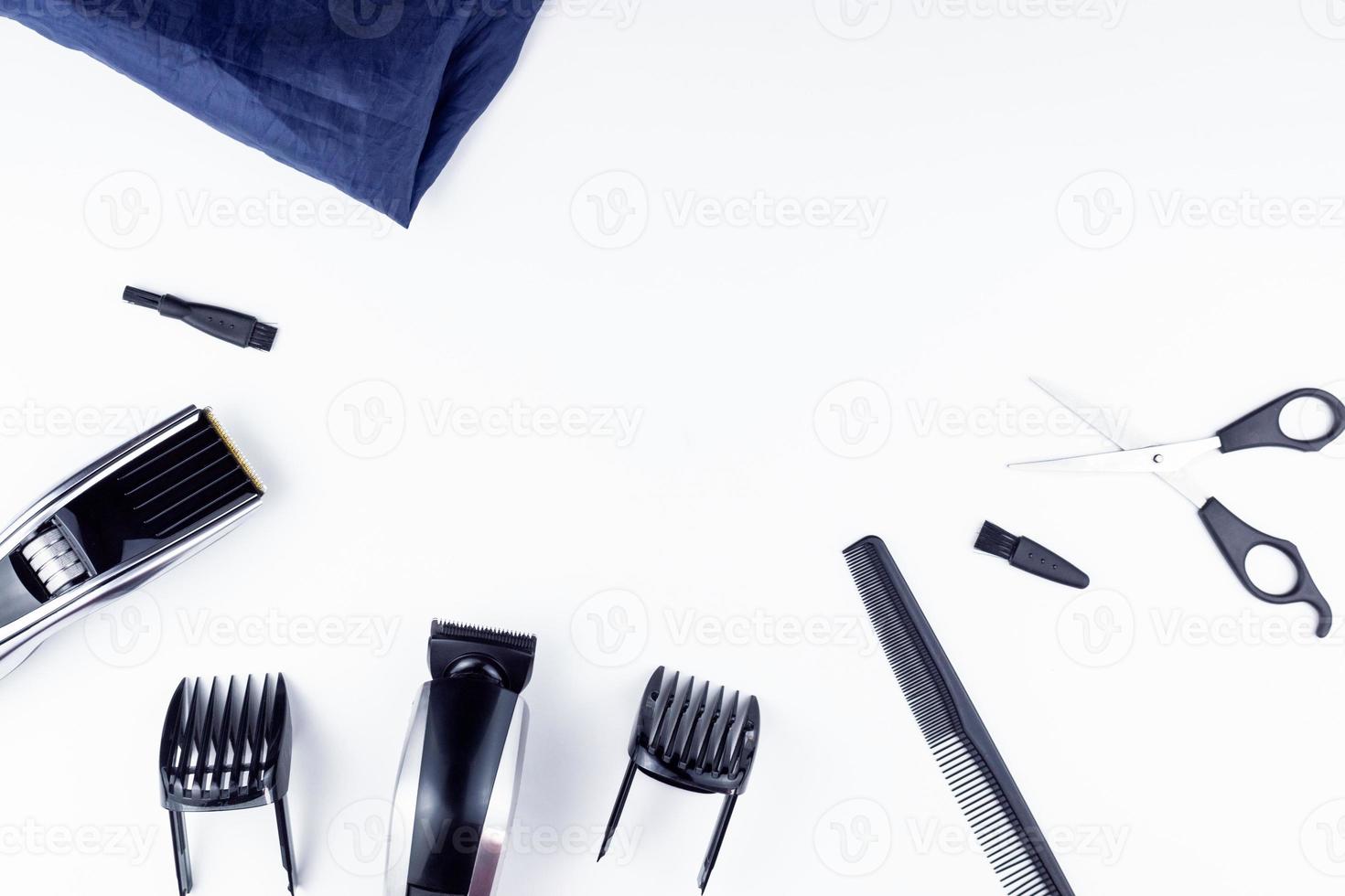 scissors and combs on white photo