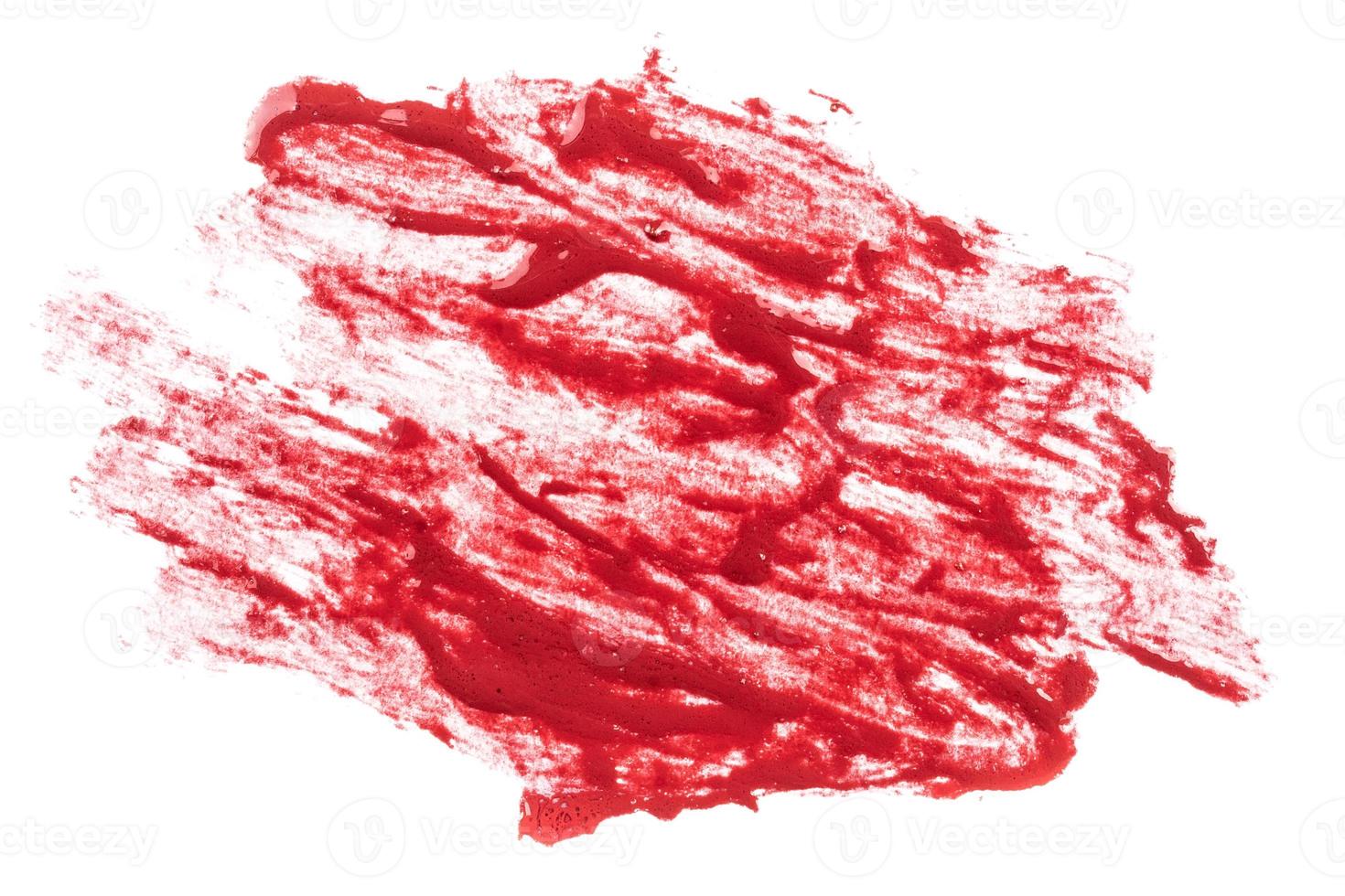 red lipstick on white background photo
