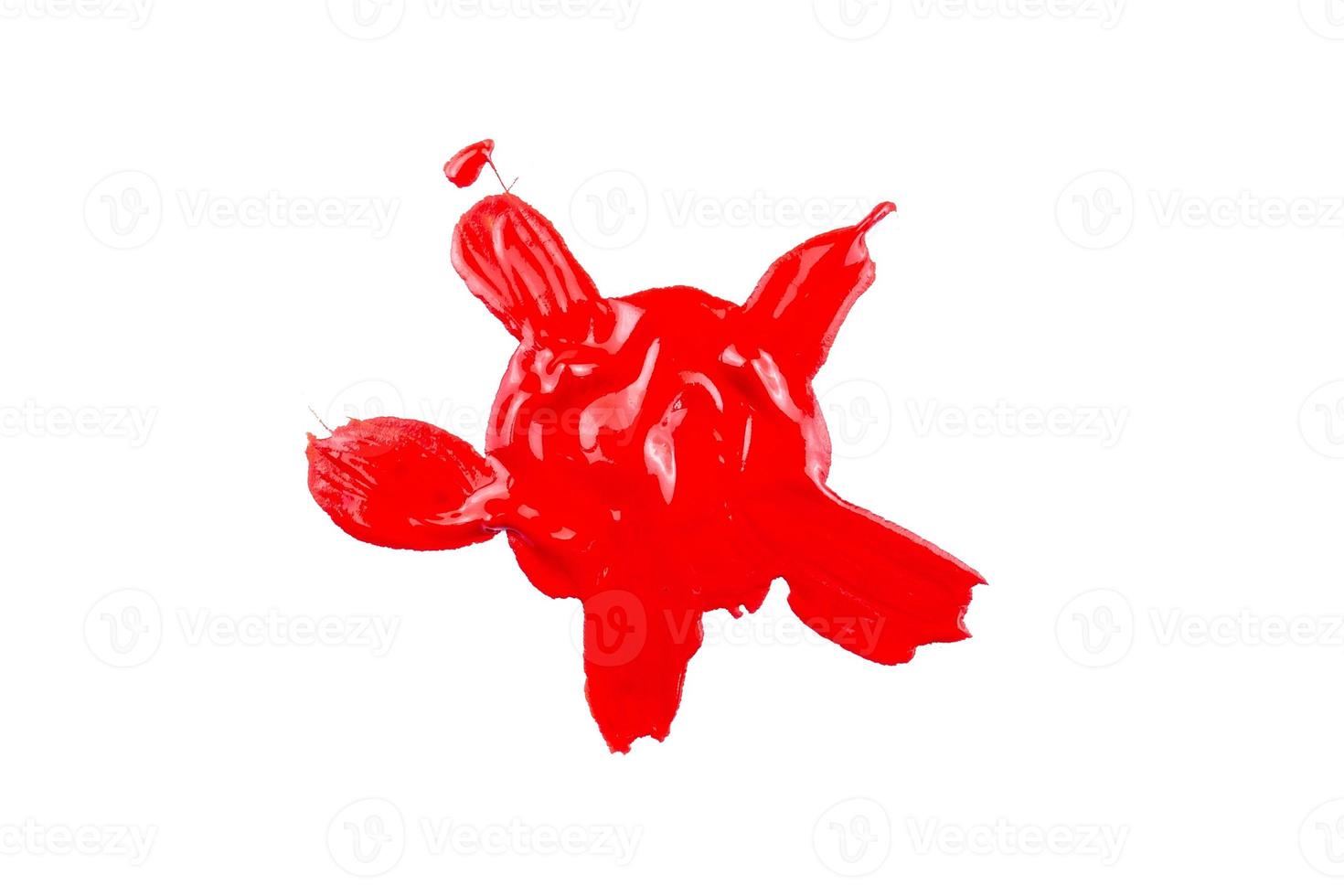 red paint on white background photo