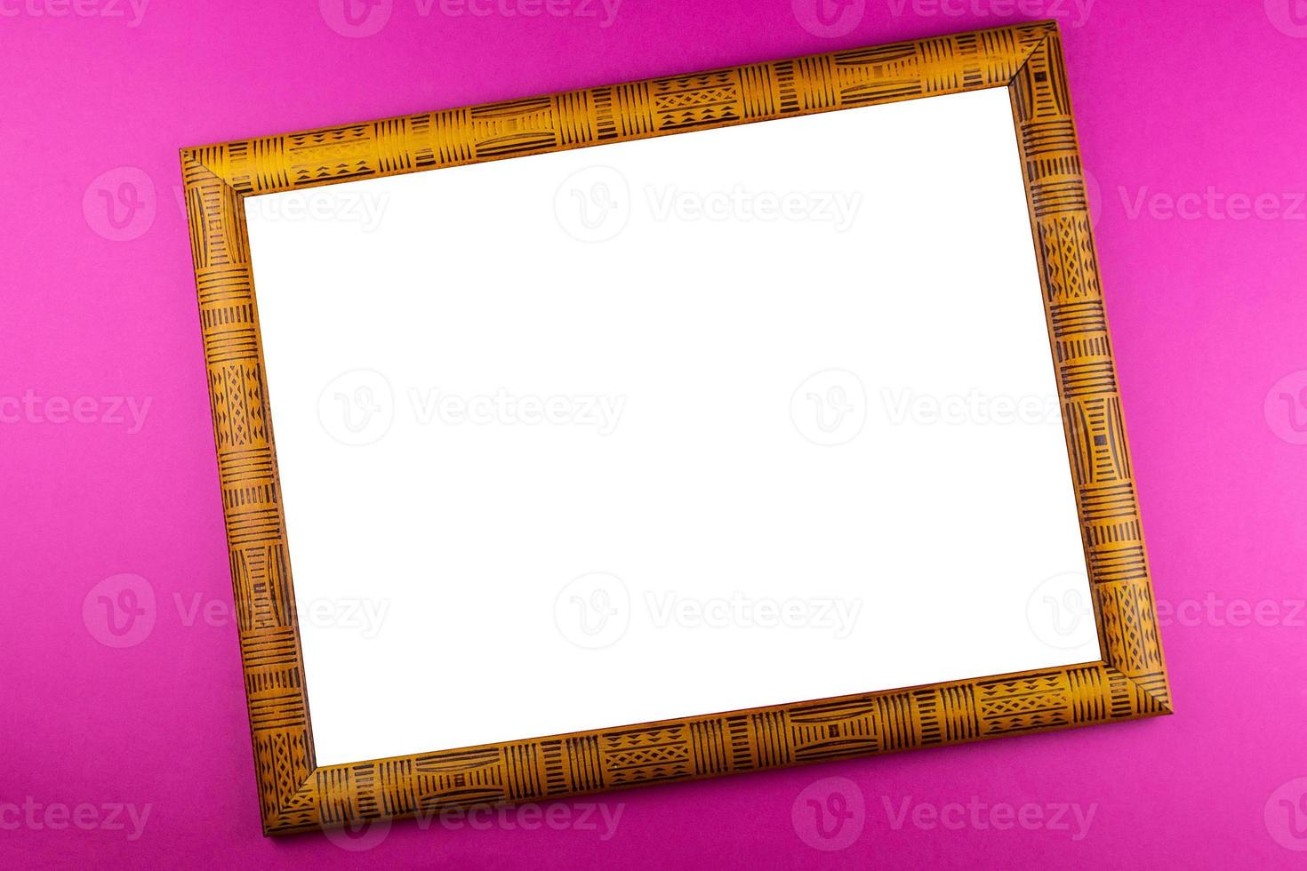 Wooden frame pink background photo